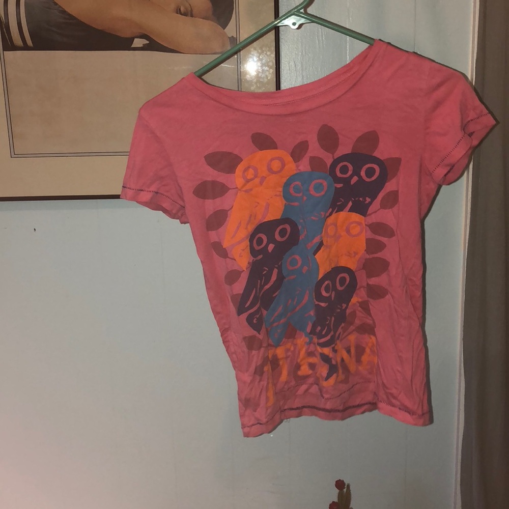 Pink owl shirt.
